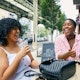 Friends catch up over a drink under the High Line.