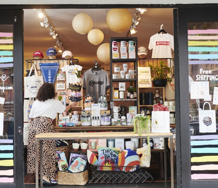 An employee adjusts face masks displayed for sale in an open window for curbside pickup at a Lockwood store in the Astoria neighborhood in the Queens borough of New York, U.S., on Friday, June 5, 2020. For New York's small businesses, which depend almost entirely on city residents, Monday marked a vital moment to start bringing in the customers and revenue they lost during the shutdown  an undertaking all the more precarious with the current social unrest. Photographer: Gabby Jones/Bloomberg via Getty Images